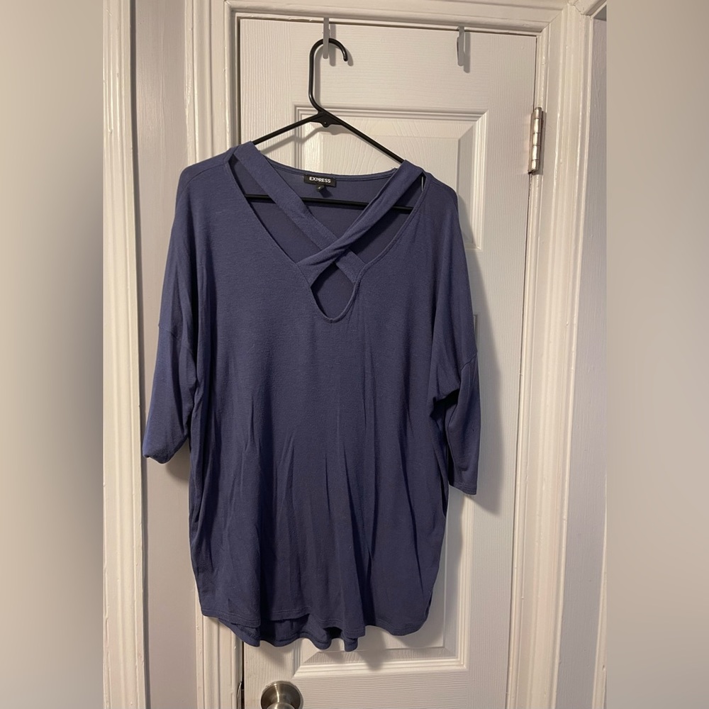 Express 3/4 sleeve shirt with criss-cross front.